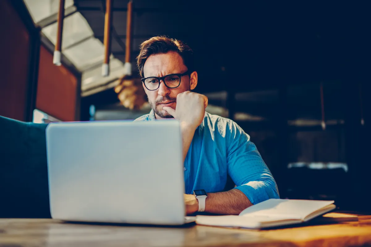 Small business owner frustrated with technology and digital challenges before finding Colee Software Services